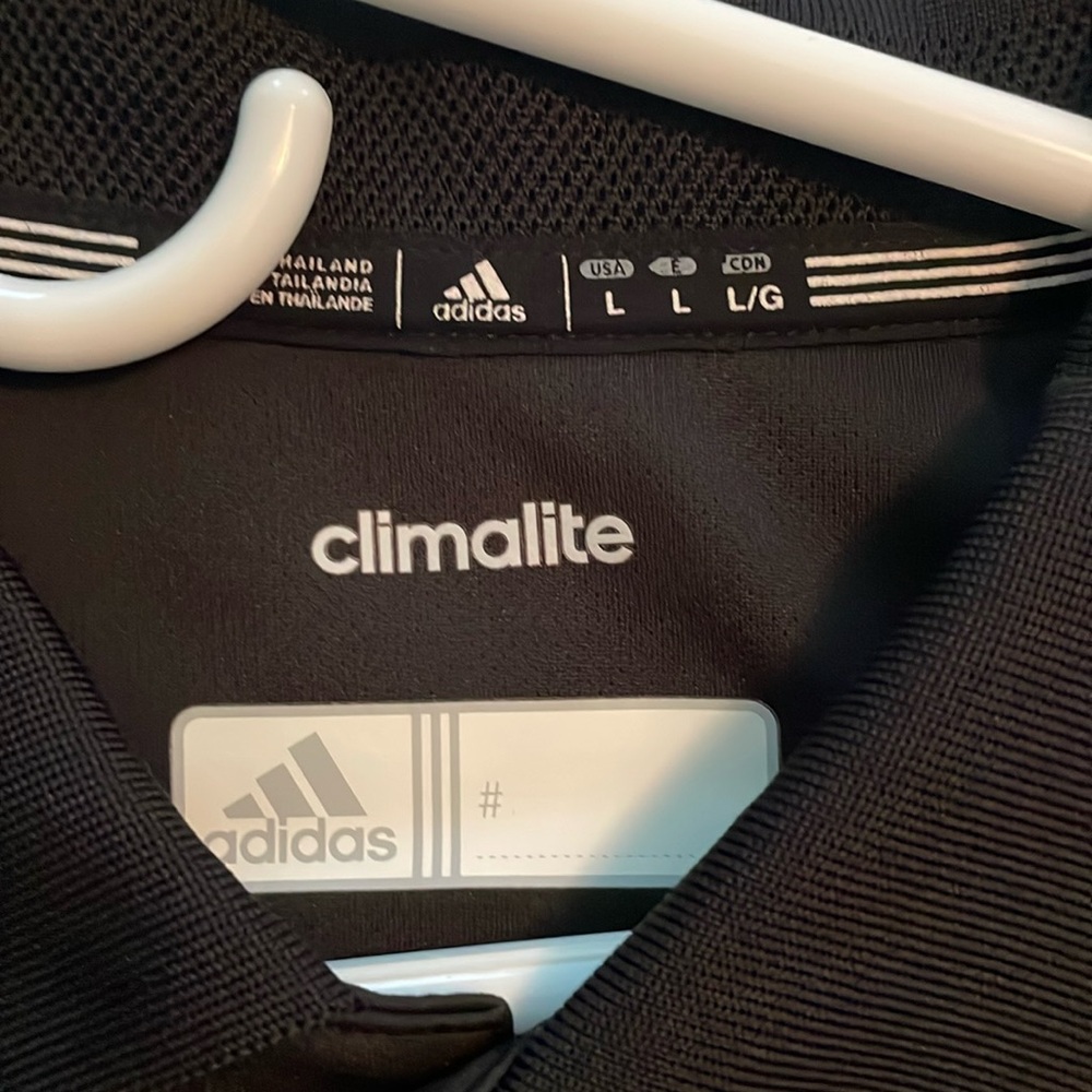 Adidas Polo. Never worn.